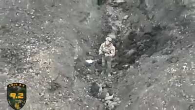 A longer video of the Russian surrendering to a Ukrainian drone
