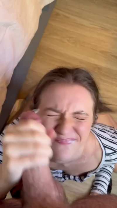 Cute brunette finishing the job for a facial