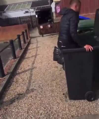 Trying to Parkour into a garbage bin