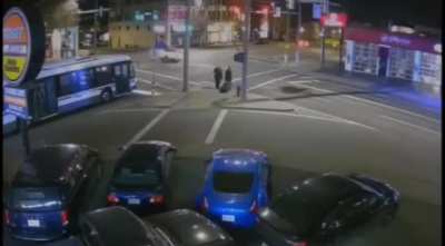Running a red light into a bus