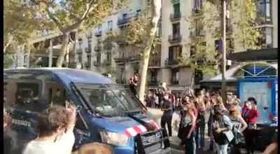 Young revolutionaries expel the police from the neighborhood after an eviction in Barcelona today