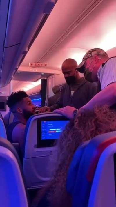 Passenger zip tied after assaulting flight attendant and air marshal.