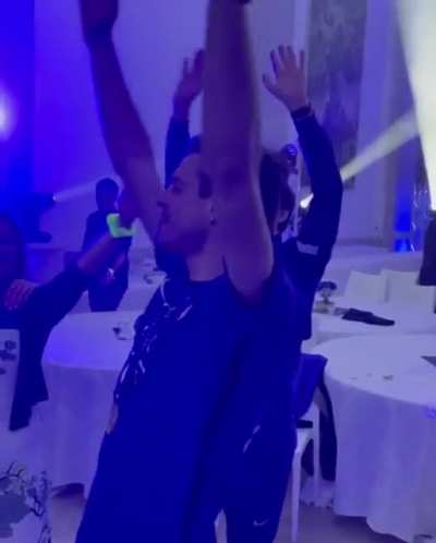 Azpi belting out We Are The Champions at the afterparty