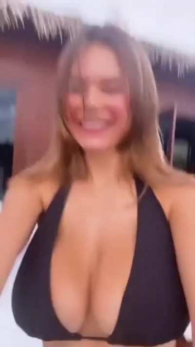 Ashley bounces on a trampoline