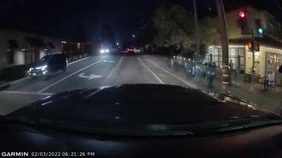 Dude ran a red light… on a skateboard