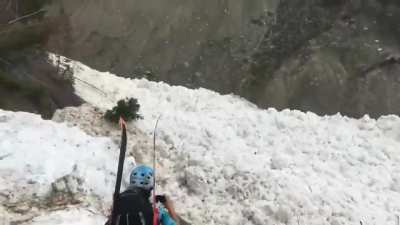 A wet snow avalanche. On average this type of avalache moves at a speed of 10-20 mph.