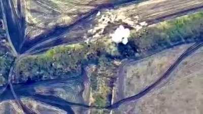 Ukrainian drone footage showing the destruction of a Russian 2S9 