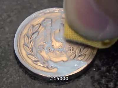 Polishing a coin