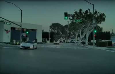 Blue Tesla Drives Straight in Left Turn Only Lane