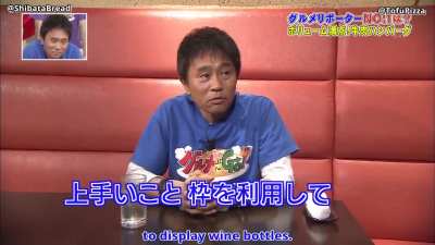 Hamada becomes a food reporter eating a 100% Beef Hamburger Steak.