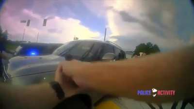 Woman with child in car rams multiple people & police cars while trying to avoid arrest