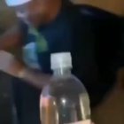 Helping a buddy open a bottle...