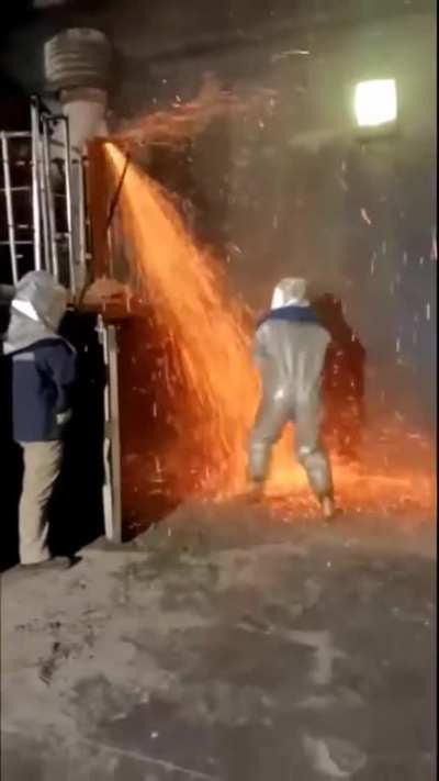 A shrunken me clearing a blockage in my nozzle