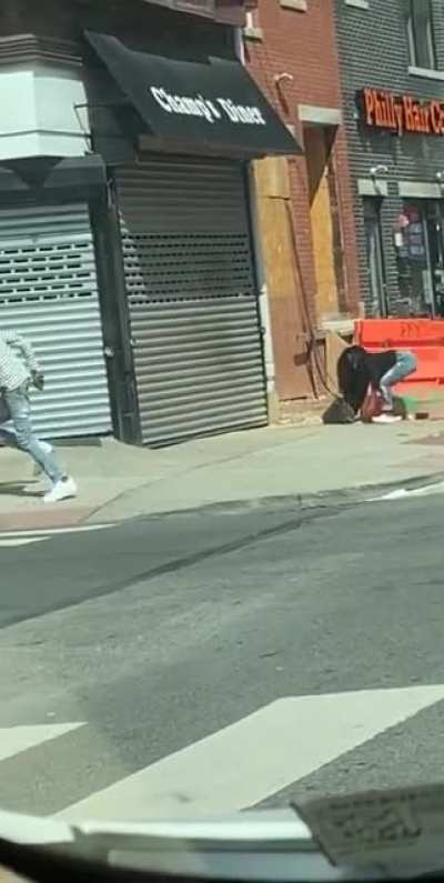 Woman shoots man after he brutally beat her on the sidewalk in broad daylight.