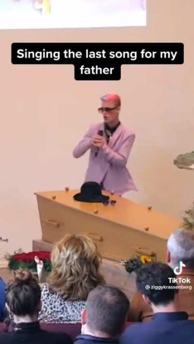 Guy sings at his dads funeral