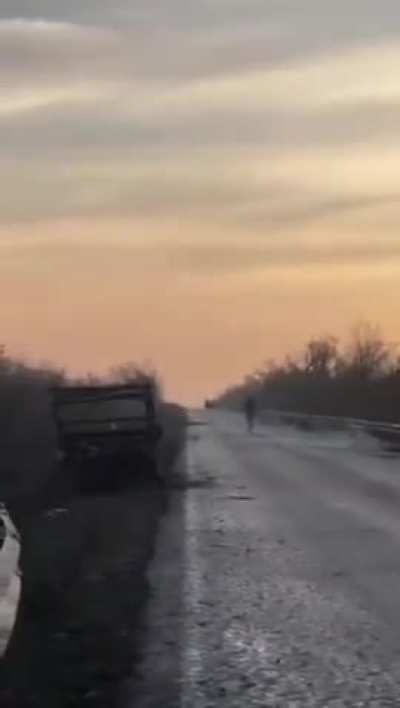 Russian sapper Tries to stop a desertcross from running into a mined section of the road, sapper is ignored and run over. Vid cuts just as explosion happens.