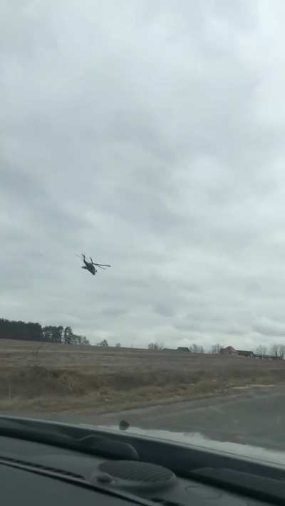 Close up of Russian helicopters flying towards Hostomel first day of the war