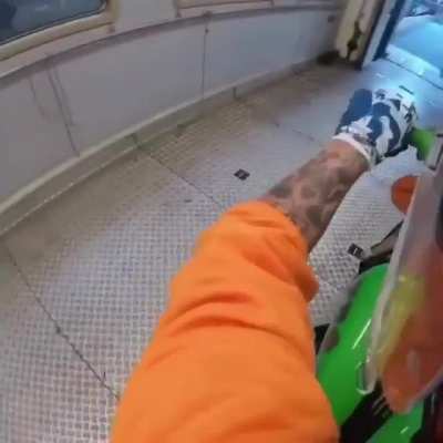 Guy rides his bike on a train