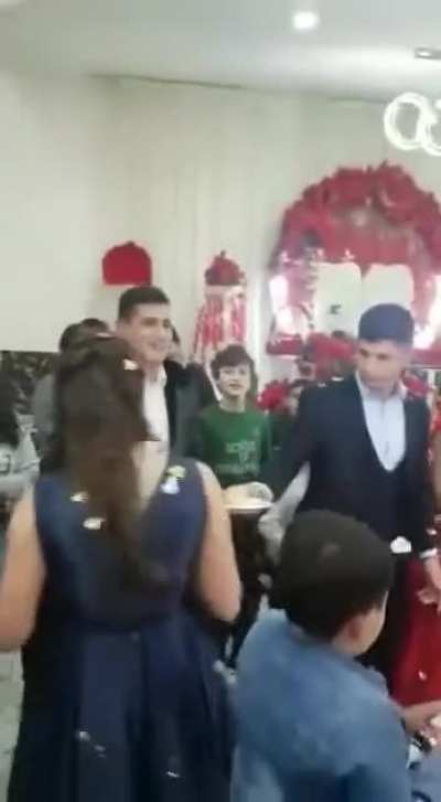 Angry groom loses it during wedding cake cutting ceremony, leaving guests and bride horrified