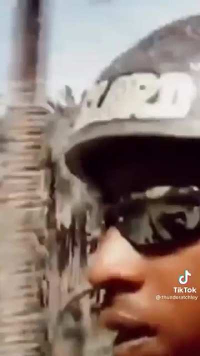 There’s cool, then there’s cruisin in a tank listening to Tupac cool