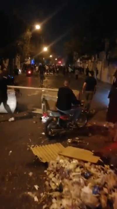 Revol<wbr>ution<wbr>aries in Iran's central street (Vali Asr) destroy CCTVs and Surveillance devices | Oct 8. Also fuck you China and your promotion of Authoritarian Surveilance states.