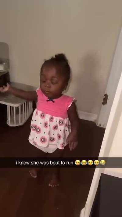 Baby tries to run from her mother...