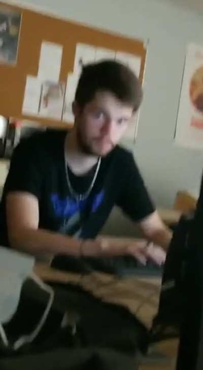 a friend went under the table to scare him