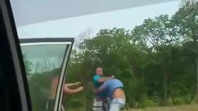 Guy driving like an idiot,tailgates a man who is driving with his wife and child. The idiot then passes and brake checks the family and corners them in with no escape leaving the dad no option but to protect his family. Idiot driver gets a lesson in 
