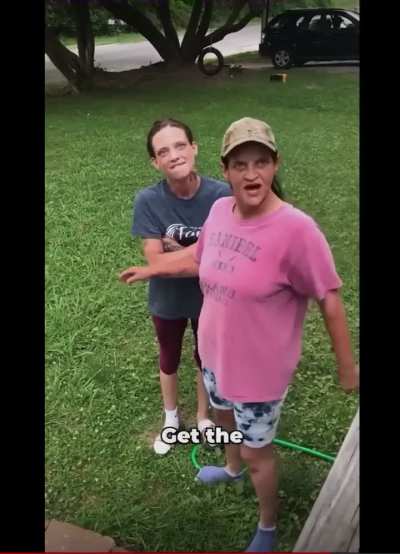 Woman goes apes**t… gets the hose.