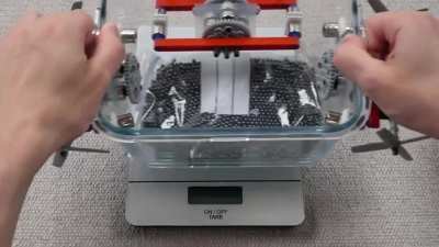 Building a Lego Submarine inside a IKEA food storage container