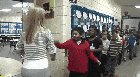 Teacher has a personalized handshake for each of her students