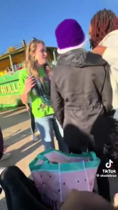 Louisiana family harasses and throws beer at elderly woman during dispute at Mardi Gras parade.