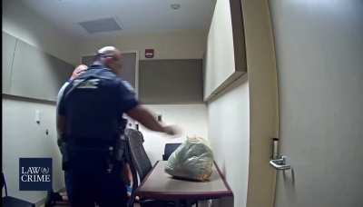 Kidnapping suspect attempts to stab police officer with pen.