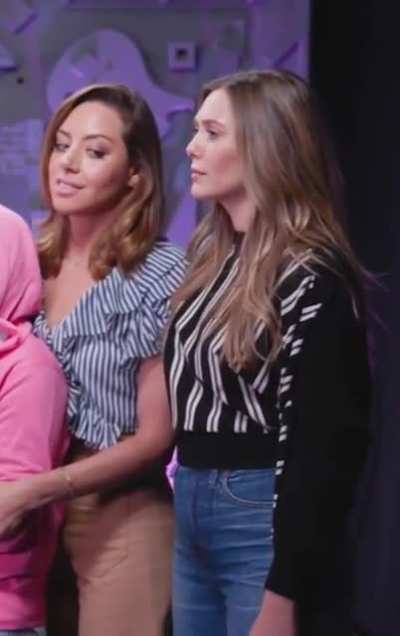 Elizabeth Olsen gives Aubrey Plaza a spank
