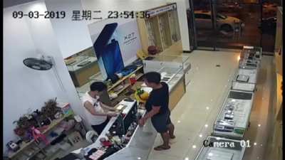 Shitting Casually in a Phone Shop