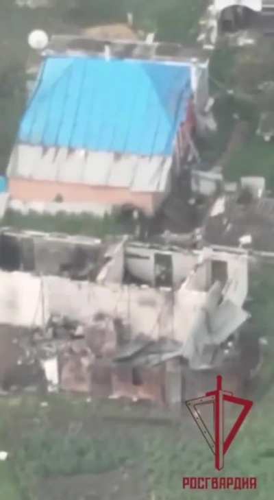 Russian solider fire ATGM at a building filled with Ukrainian soliders.