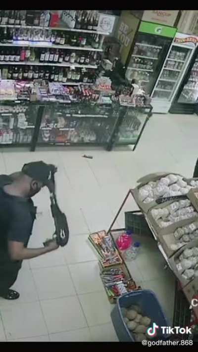 Guard’s gun goes off while casually talking to a customer