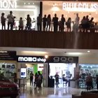 Mall is flooding and the band plays an appropriate song