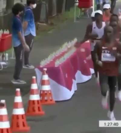 French Olympic marathon runner Mohad Amdouni intentionally knocking over all the water to screw the other runners over