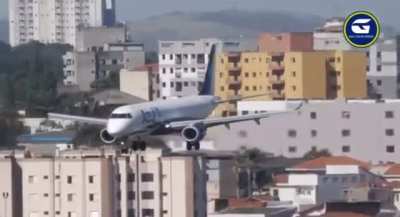 Nose gear touching down before mains on an unstable Azul E-190 landing