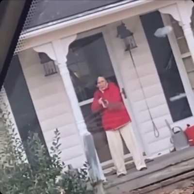 Woman points gun at Amazon delivery driver