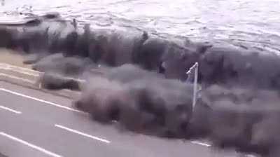 The slow yet unstoppable deluge of water during a Tsunami