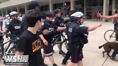 Man Shows Up In Blackface To A Toronto Protest & Gets Taken Away By Police Officers!