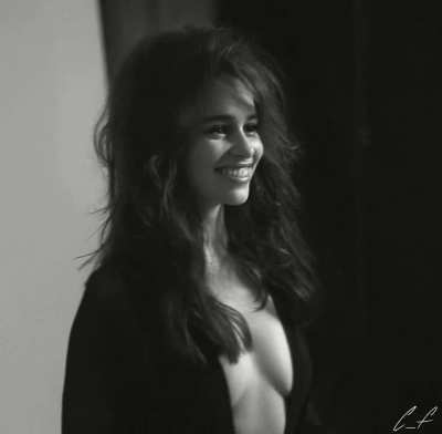 Emilia Clarke's open shirt cleavage