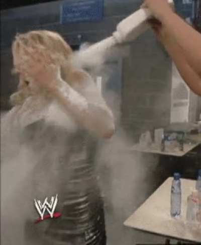 Melina pours powder all over a smug Jillian Hall