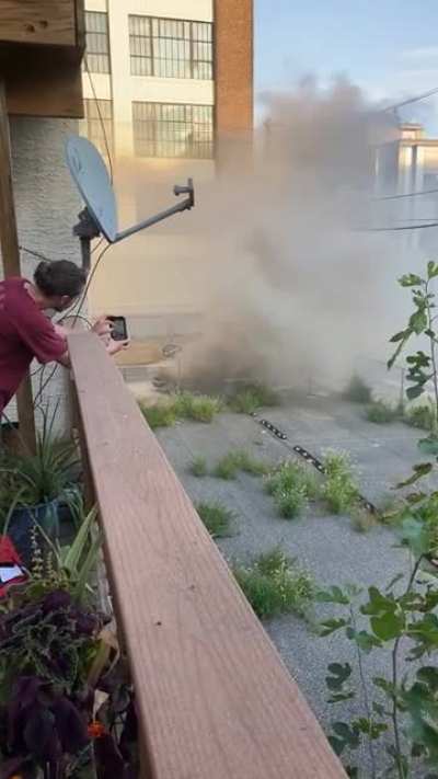 Caught the smoking truck that pulled over in front of my house blowing up. An inferno ensued.