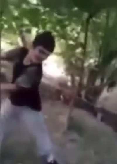 Kid playing with a bomb