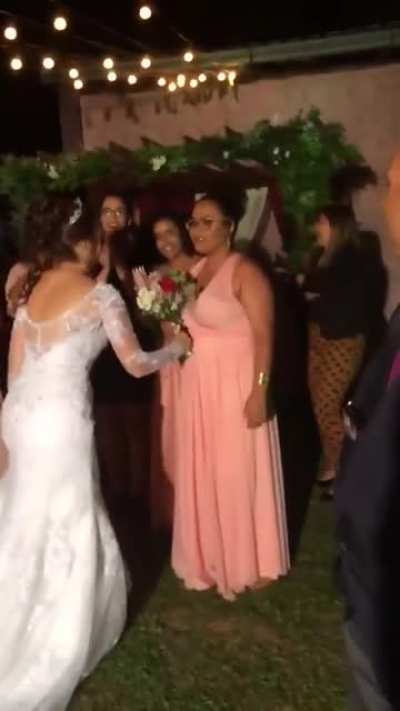A bouquet toss in a wedding