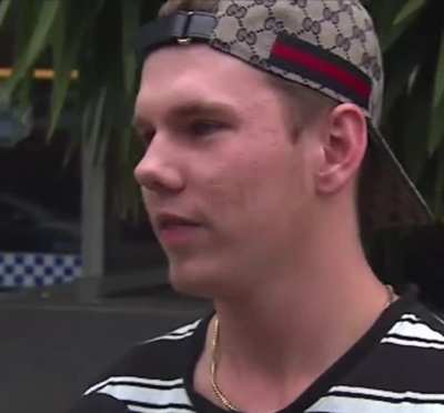 Australian man conducts interview with local news regarding an alleged robbery