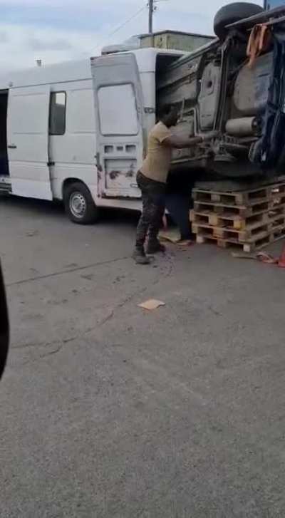 To load a car into a van.